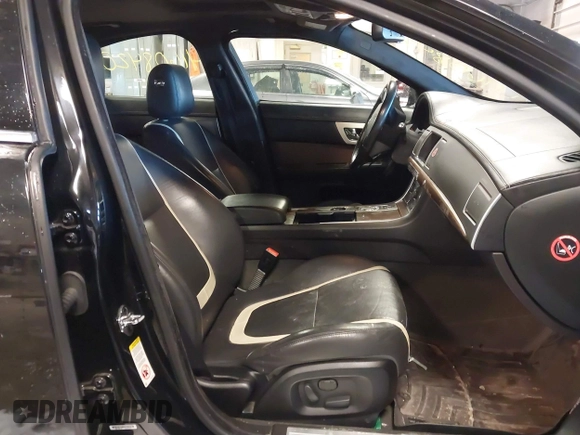 2014 Jaguar XF V6 SC with VIN SAJWJ0EF2E8U13746, listed as a IAAI auction lot 41608420 with 141,476 mi miles. Bid and sale history available at carsss.com. Image 5.