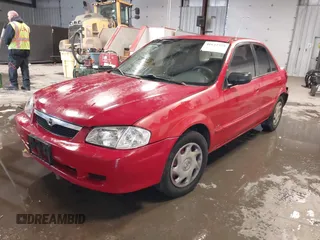 2000 Mazda Protege DX with VIN JM1BJ2220Y0258658, listed as a IAAI auction lot 41622579 with 276,682 mi miles and . Bid and sale history available at DreamBid. Image 2.