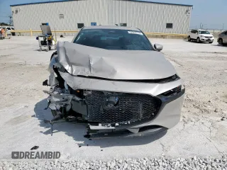 2024 Mazda 3 S Preferred with VIN JM1BPALM5R1721303, listed as a Copart auction lot 52949115 with 4,557 mi miles and Salvage title. Bid and sale history available at DreamBid. Image 5.
