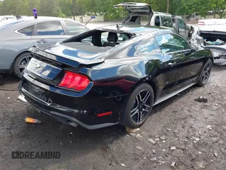 2020 Ford Mustang EcoBoost with VIN 1FA6P8TH4L5161843, listed as a IAAI auction lot 42242171 with 45,892 mi miles and . Bid and sale history available at DreamBid. Image 4.
