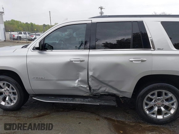 2015 GMC Yukon SLT with VIN 1GKS2BKC0FR676107, listed as a IAAI auction lot 41962929 with 132,389 mi miles. Bid and sale history available at carsss.com. Image 15.