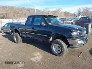 1997 Ford F-150 XL with VIN 1FTDX18W7VKC26527, listed as a IAAI auction lot 41692112 with 187,720 mi miles. Bid and sale history available at carsss.com. Image 1.