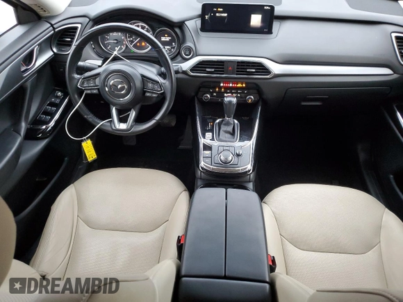 2022 Mazda CX-9 Touring with VIN JM3TCBCY2N0607128, listed as a Copart auction lot 86246044 with 61,526 mi miles and Salvage Title. Bid and sale history available at DreamBid. Image 8.