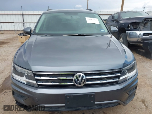 2021 Volkswagen Tiguan S with VIN 3VV0B7AX0MM017433, listed as a IAAI auction lot 42017125 with 54,624 mi miles and . Bid and sale history available at DreamBid. Image 13.