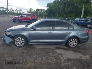 2014 Volkswagen Jetta SE with VIN 3VWD07AJ9EM277085, listed as a IAAI auction lot 42531957 with 171,613 mi miles and . Bid and sale history available at DreamBid. Image 15.