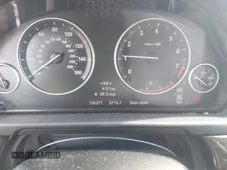 2013 BMW 5 Series 528i with VIN WBAXG5C52DD230956, listed as a IAAI auction lot 42107778 with 126,377 mi miles and . Bid and sale history available at carsss.com. Image 7.