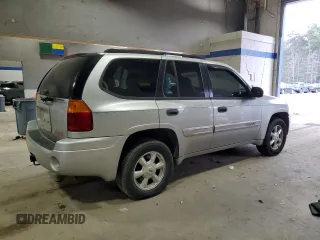 2005 GMC Envoy SLT with VIN 1GKDT13S652197929, listed as a Copart auction lot 42104855 with 228,515 mi miles and Salvage Title. Bid and sale history available at carsss.com. Image 3.