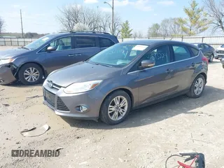 2012 Ford Focus SEL with VIN 1FAHP3M23CL460208, listed as a IAAI auction lot 41893224 with 146,553 mi miles. Bid and sale history available at carsss.com. Image 2.