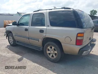 2002 Chevrolet Tahoe LS z VIN 1GNEC13V22R206341, wystawiony jako IAAI lot #42436560 z przebiegiem 271 904 mil mil oraz . Historia ofert i sprzedaży dostępna na DreamBid. Obrazek 3.