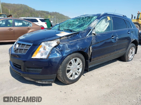 2011 Cadillac SRX Luxury Collection z VIN 3GYFNDEY5BS584936, wystawiony jako IAAI lot #42103176 z przebiegiem 141 647 mil mil oraz . Historia ofert i sprzedaży dostępna na DreamBid. Obrazek 2.