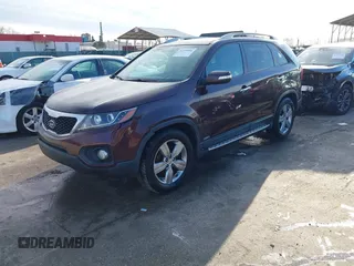 2012 Kia Sorento EX with VIN 5XYKUDA25CG239594, listed as a IAAI auction lot 41754946 with 135,005 mi miles. Bid and sale history available at carsss.com. Image 2.