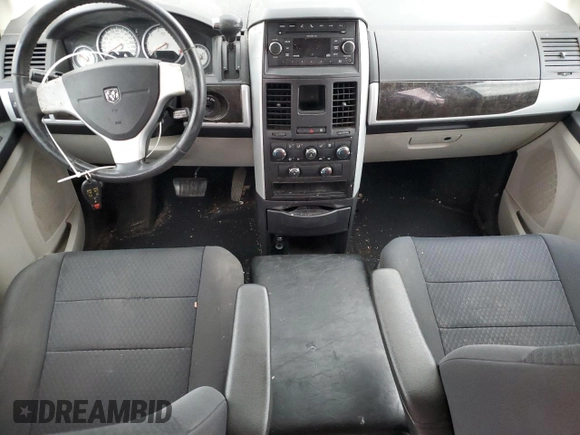 2010 Dodge Grand Caravan SXT with VIN 2D4RN5DX4AR124702, listed as a Copart auction lot 51654365 with 231,910 mi miles and Salvage Title. Bid and sale history available at DreamBid. Image 8.