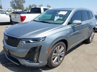 2023 Cadillac XT6 FWD Premium Luxury with VIN 1GYKPCRS6PZ163018, listed as a IAAI auction lot 42437403 with 21,366 mi miles and . Bid and sale history available at DreamBid. Image 2.