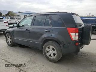 2009 Suzuki Grand Vitara with VIN JS3TE044094100649, listed as a Copart auction lot 52033855 with 137,460 mi miles and Salvage title. Bid and sale history available at DreamBid. Image 2.