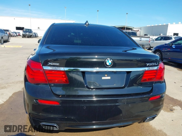 2015 BMW 7 Series 750Li xDrive with VIN WBAYF8C59FD655120, listed as a IAAI auction lot 41315152 with 82,244 mi miles and . Bid and sale history available at carsss.com. Image 16.