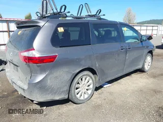 2016 Toyota Sienna LE with VIN 5TDJK3DC9GS130774, listed as a IAAI auction lot 42033495 with 228,289 mi miles. Bid and sale history available at carsss.com. Image 4.