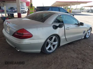 2003 Mercedes-Benz SL 500 with VIN WDBSK75F53F008054, listed as a IAAI auction lot 42506066 with Not provided miles and . Bid and sale history available at DreamBid. Image 4.