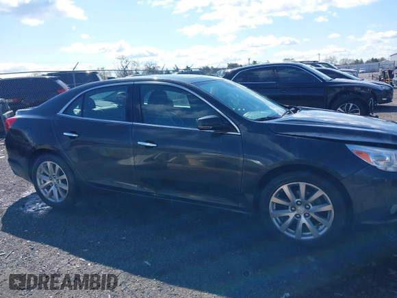 2016 Chevrolet Malibu LTZ with VIN 1G11E5SA4GU120792, listed as a IAAI auction lot 42019739 with 260,487 mi miles and . Bid and sale history available at DreamBid. Image 14.
