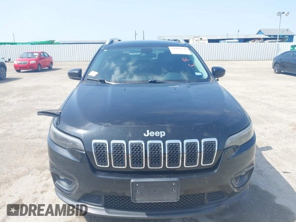 2019 Jeep Cherokee Latitude Plus with VIN 1C4PJLLB3KD377525, listed as a IAAI auction lot 41894239 with 143,711 mi miles and . Bid and sale history available at DreamBid. Image 6.