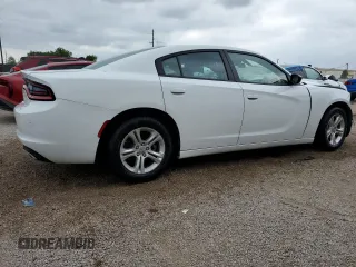 2023 Dodge Charger SXT with VIN 2C3CDXBG3PH563638, listed as a Copart auction lot 52864805 with 55,556 mi miles and Non Repairable. Bid and sale history available at DreamBid. Image 3.