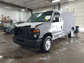 2014 Ford Econoline Cargo Commercial with VIN 1FTNE2EW4EDA64221, listed as a IAAI auction lot 41628147 with 190,018 mi miles and . Bid and sale history available at DreamBid. Image 2.