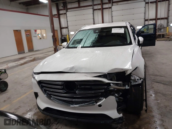 2022 Mazda CX-9 Sport z VIN JM3TCBBYXN0603653, wystawiony jako IAAI lot #42325893 z przebiegiem 57 480 mil mil oraz . Historia ofert i sprzedaży dostępna na DreamBid. Obrazek 12.