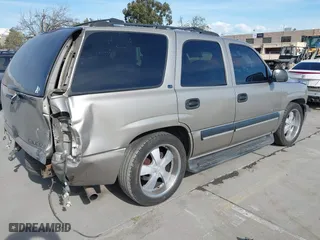 2001 Chevrolet Tahoe LS with VIN 1GNEK13T51J203013, listed as a IAAI auction lot 41886371 with 218,779 mi miles. Bid and sale history available at carsss.com. Image 4.