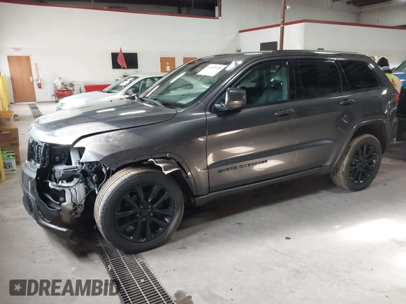 2018 Jeep Grand Cherokee Laredo E with VIN 1C4RJFAG5JC343101, listed as a IAAI auction lot 41211158 with 105,886 mi miles. Bid and sale history available at carsss.com. Image 17.