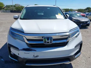 2022 Honda Pilot Touring 7-Passenger с VIN 5FNYF5H66NB034248, выставлен на аукционе IAAI как лот 41777362 с пробегом 26 611 миль миль и . История ставок и продаж доступна на DreamBid. Изображение 11.