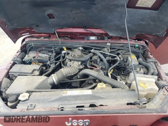 2007 Jeep Wrangler Sahara с VIN 1J4FA54137L205242, выставлен на аукционе Copart как лот 65080025 с пробегом 128 682 миль миль и Списание • Salvage title. История ставок и продаж доступна на DreamBid. Изображение 11.