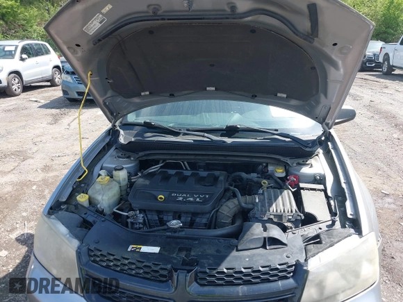 2014 Dodge Avenger SE with VIN 1C3CDZAB0EN133684, listed as a IAAI auction lot 41923432 with 158,771 mi miles and . Bid and sale history available at DreamBid. Image 10.