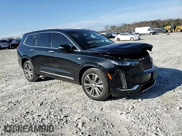 2021 Cadillac XT6 Premium Luxury z VIN 1GYKPDRS6MZ150397, wystawiony jako Copart lot #85137654 z przebiegiem 52 305 mil mil oraz Szkoda całkowita • Salvage title. Historia ofert i sprzedaży dostępna na DreamBid. Obrazek 11.