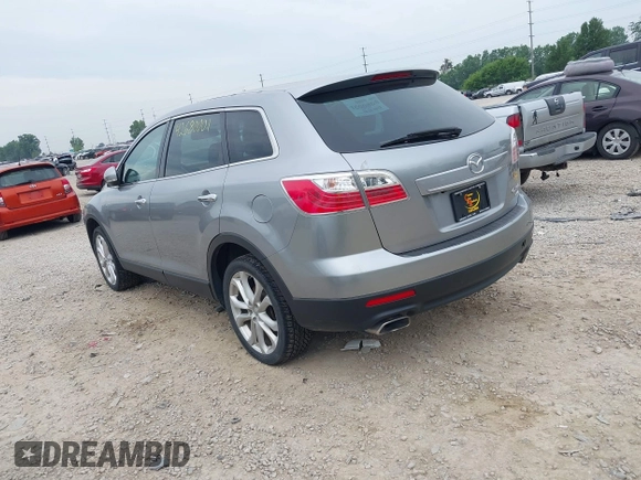2012 Mazda CX-9 Grand Touring z VIN JM3TB3DV0C0367314, wystawiony jako IAAI lot #42680001 z przebiegiem 239 975 mil mil oraz . Historia ofert i sprzedaży dostępna na DreamBid. Obrazek 3.