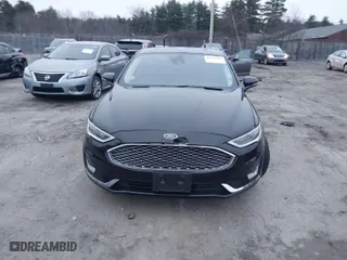 2020 Ford Fusion Hybrid Titanium with VIN 3FA6P0RU7LR141332, listed as a IAAI auction lot 40994365 with 106,592 mi miles. Bid and sale history available at carsss.com. Image 13.