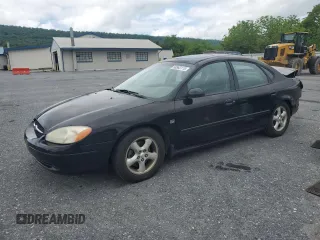 2001 Ford Taurus SEL with VIN 1FAFP56S01A258399, listed as a Copart auction lot 58963115 with 162,989 mi miles and Salvage title. Bid and sale history available at DreamBid. Image 1.
