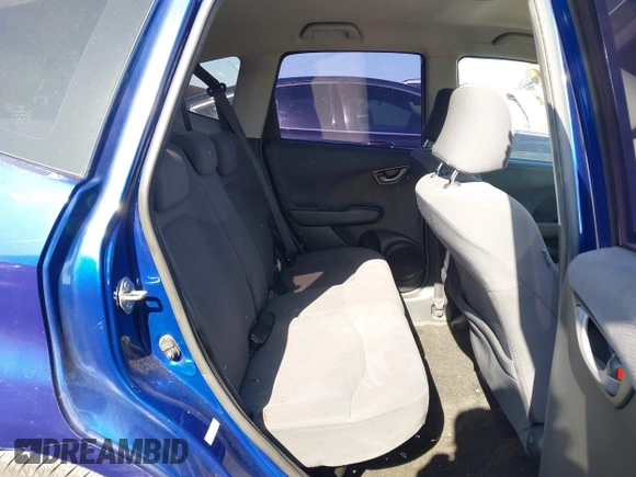 2009 Honda Fit with VIN JHMGE88279S071667, listed as a IAAI auction lot 42035664 with 235,791 mi miles. Bid and sale history available at carsss.com. Image 8.