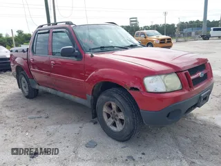 2005 Ford Explorer Sport Trac XLS z VIN 1FMZU77K85UB64779, wystawiony jako IAAI lot #42442048 z przebiegiem 96 734 mil mil oraz . Historia ofert i sprzedaży dostępna na DreamBid. Obrazek 1.