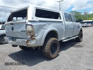 2018 Ram 2500 Laramie with VIN 3C6UR5FL3JG301310, listed as a IAAI auction lot 42239570 with 189,853 mi miles and . Bid and sale history available at DreamBid. Image 4.