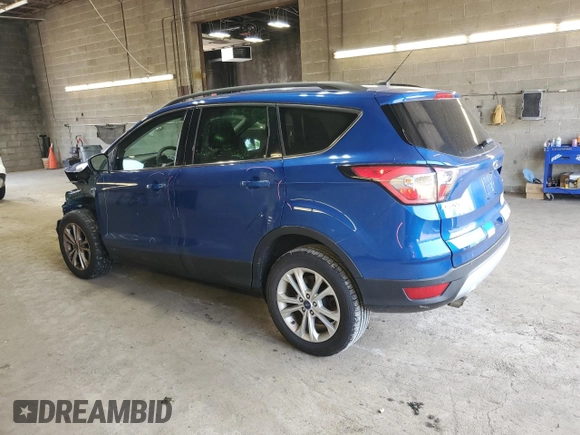 2017 Ford Escape SE z VIN 1FMCU9GD4HUD17066, wystawiony jako Copart lot #60504105 z przebiegiem 64 570 mil mil oraz Szkoda całkowita • Salvage title. Historia ofert i sprzedaży dostępna na DreamBid. Obrazek 2.