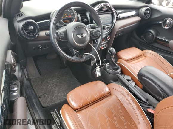 2017 MINI Convertible Cooper S с VIN WMWWG9C5XH3C80635, выставлен на аукционе Copart как лот 56167715 с пробегом 79 485 миль миль и Списание • Salvage title. История ставок и продаж доступна на DreamBid. Изображение 8.