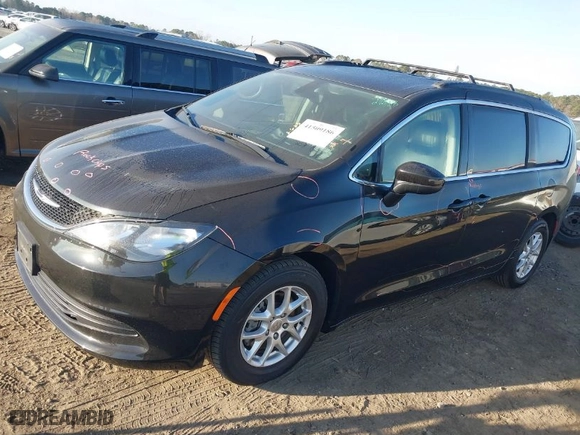 2020 Chrysler Voyager LXI with VIN 2C4RC1DG1LR255231, listed as a IAAI auction lot 41509186 with 77,354 mi miles. Bid and sale history available at carsss.com. Image 2.