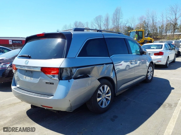 2016 Honda Odyssey SE with VIN 5FNRL5H38GB109733, listed as a IAAI auction lot 41882527 with 123,087 mi miles. Bid and sale history available at carsss.com. Image 4.