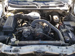 1999 Dodge Durango with VIN 1B4HR28Y0XF544369, listed as a Copart auction lot 52482525 with 232,180 mi miles and Salvage Title. Bid and sale history available at DreamBid. Image 12.