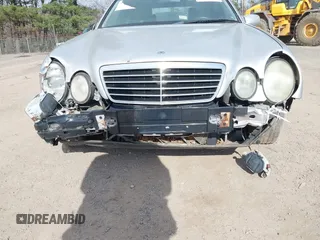 2000 Mercedes-Benz E-Class with VIN WDBJF82J0YX037784, listed as a IAAI auction lot 41768970 with 144,062 mi miles. Bid and sale history available at carsss.com. Image 6.