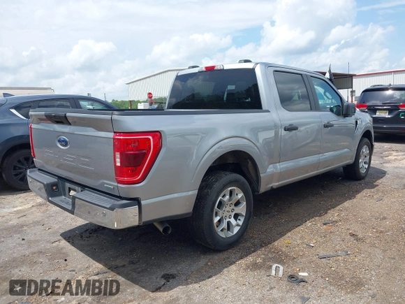 2023 Ford F-150 XL with VIN 1FTEW1C84PKD69454, listed as a IAAI auction lot 42087856 with 53,164 mi miles. Bid and sale history available at carsss.com. Image 4.