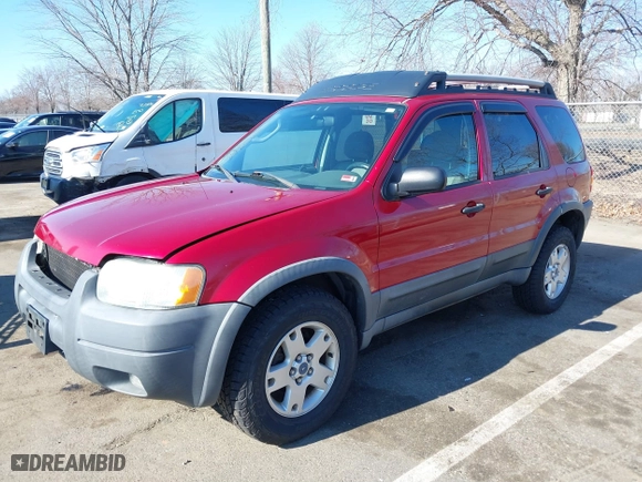 2003 Ford Escape XLT Popular 2 with VIN 1FMCU93183KC65571, listed as a IAAI auction lot 41768982 with 150,658 mi miles. Bid and sale history available at carsss.com. Image 17.