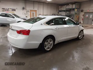 2015 Chevrolet Impala LS with VIN 1G11X5SL8FU137945, listed as a IAAI auction lot 42052327 with 65,327 mi miles and . Bid and sale history available at DreamBid. Image 4.