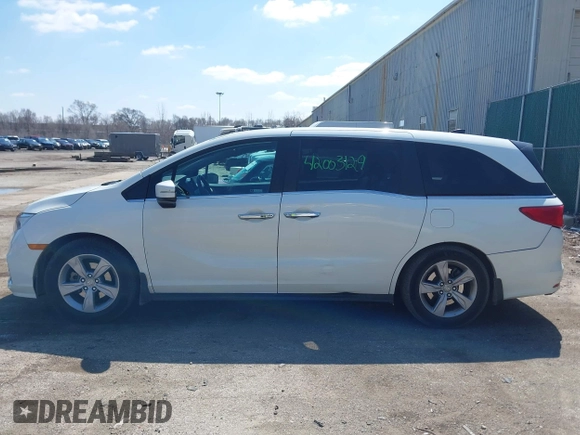 2018 Honda Odyssey EX-L z VIN 5FNRL6H70JB102713, wystawiony jako IAAI lot #42003129 z przebiegiem 410 500 mil mil oraz . Historia ofert i sprzedaży dostępna na DreamBid. Obrazek 14.