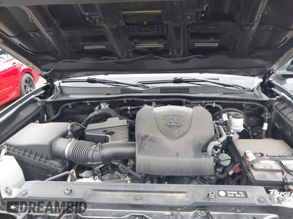 2018 Toyota Tacoma SR5 with VIN 3TMAZ5CN0JM061233, listed as a IAAI auction lot 41944668 with 94,314 mi miles and . Bid and sale history available at DreamBid. Image 10.