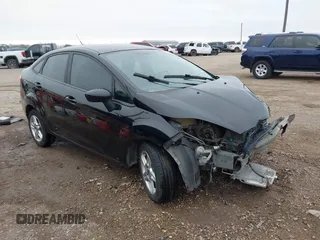 2017 Ford Fiesta SE z VIN 3FADP4BJ7HM137543, wystawiony jako IAAI lot #41555369 z przebiegiem 141 780 mil mil oraz . Historia ofert i sprzedaży dostępna na DreamBid. Obrazek 1.